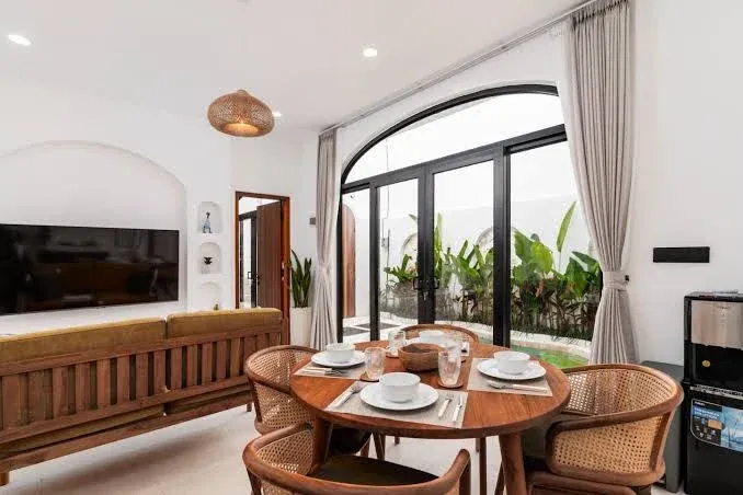 Light-Filled Dining Opening to Courtyard